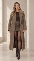 Full front view of model wearing a mocha textured longline overcoat with notch lapels