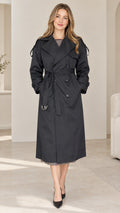 Front view of model wearing black double-breasted long belted trench coat