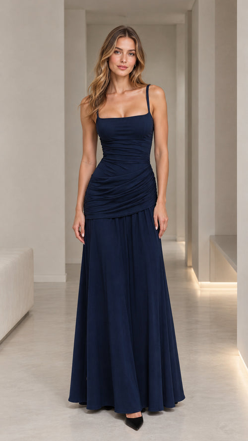Front view of model wearing Navy Blue square neck ruched bodice maxi dress