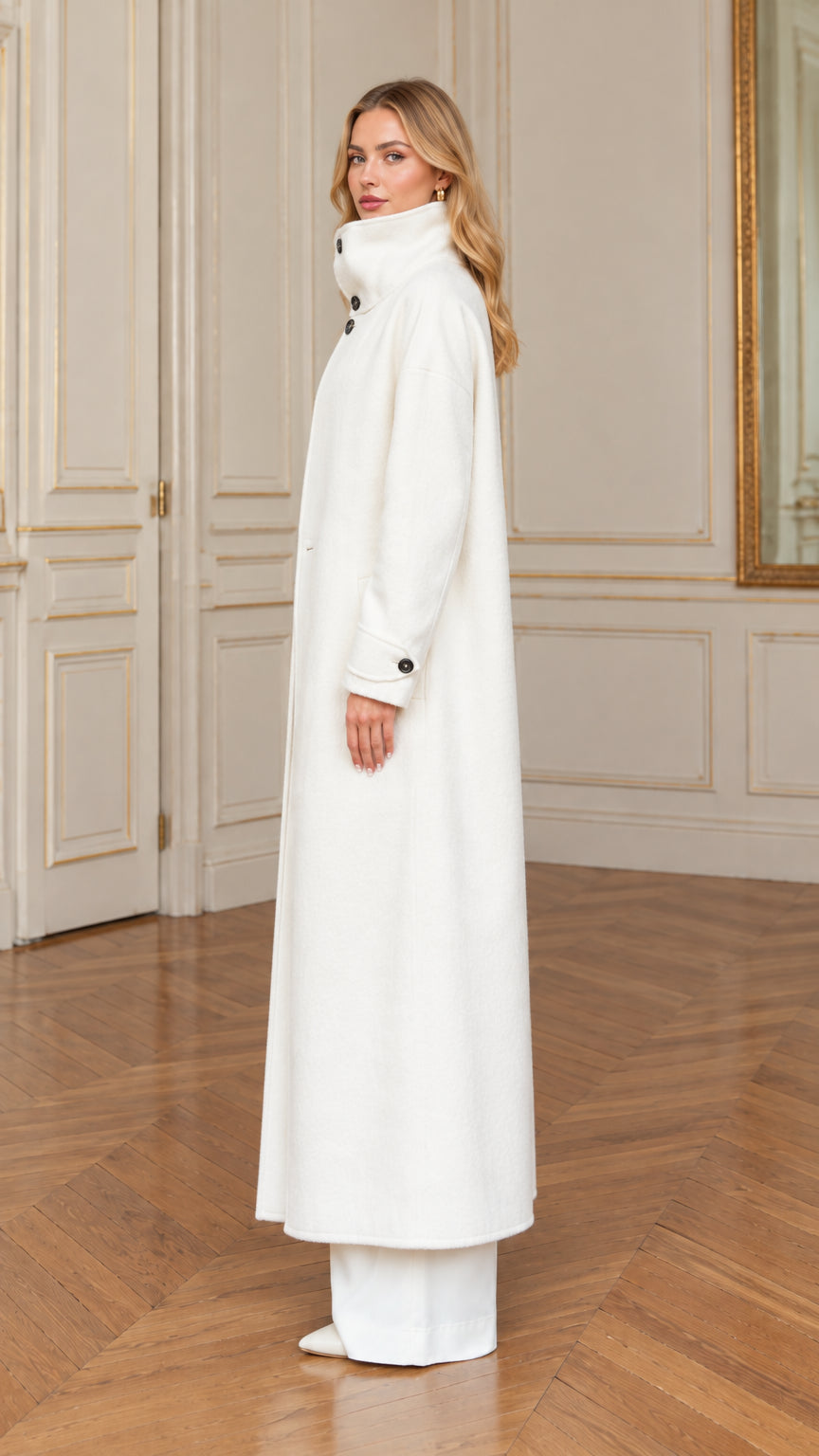 Side profile view of the off-white full-length stand collar overcoat