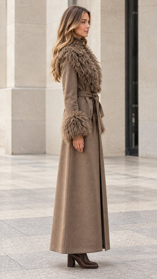 Side profile view of model in brown floor-length belted winter coat