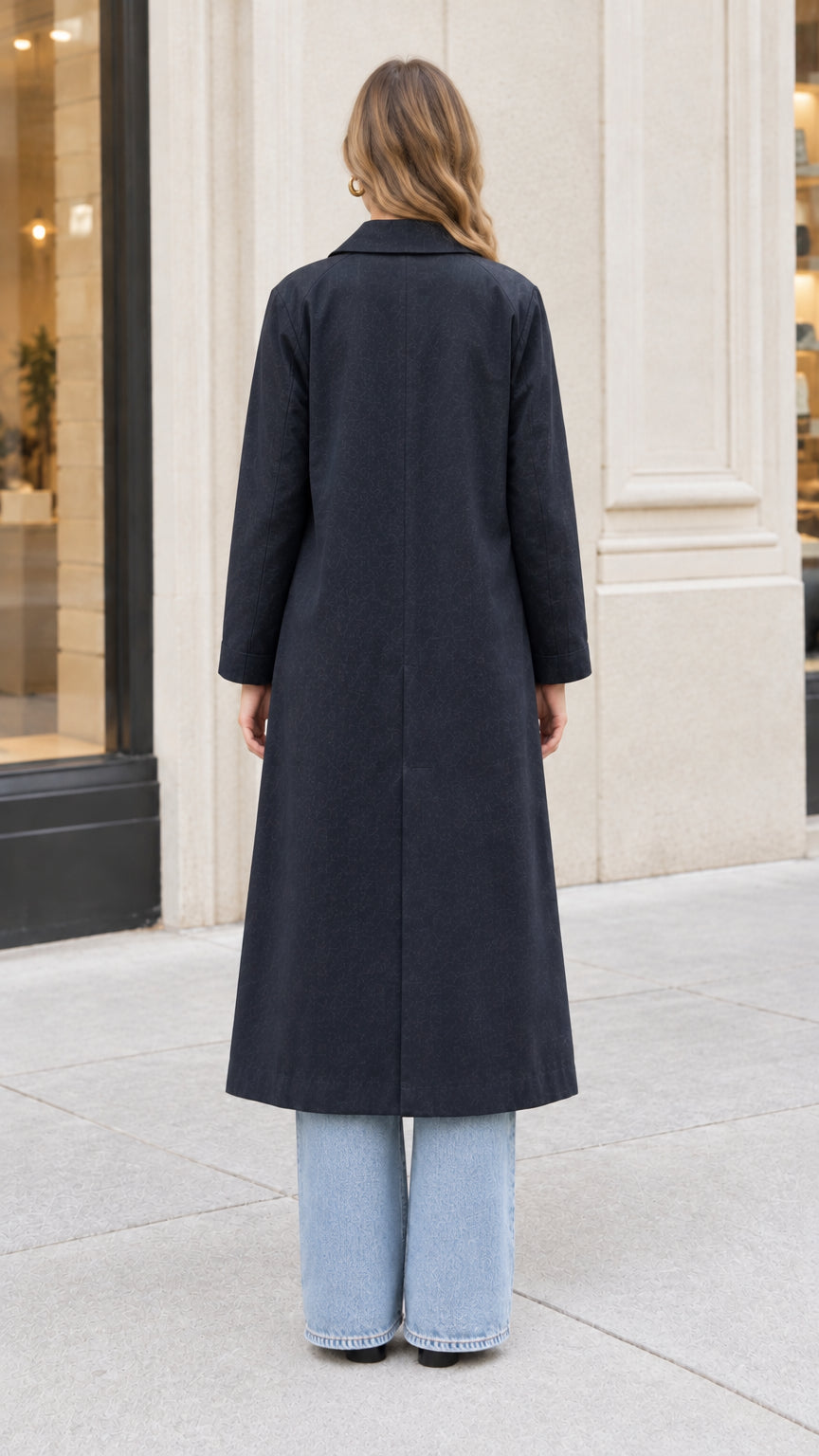 Back full view of woman wearing Navy Blue longline coat showing central back vent