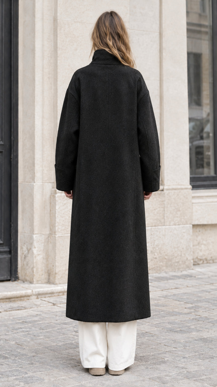 Back full view of woman wearing Black long double-breasted overcoat