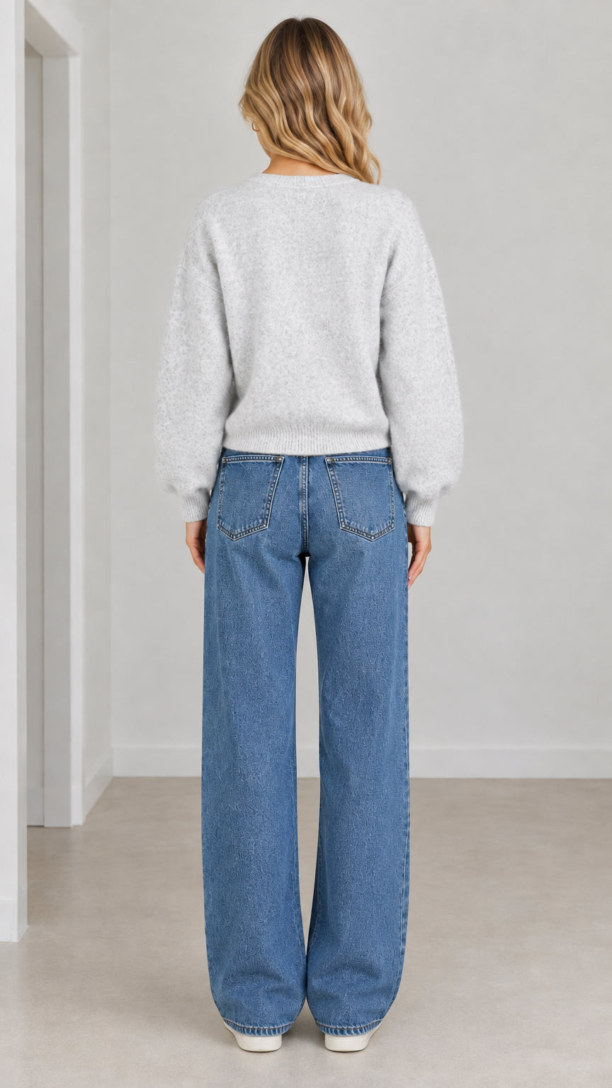 Back view of woman wearing Light Grey fuzzy knit cardigan