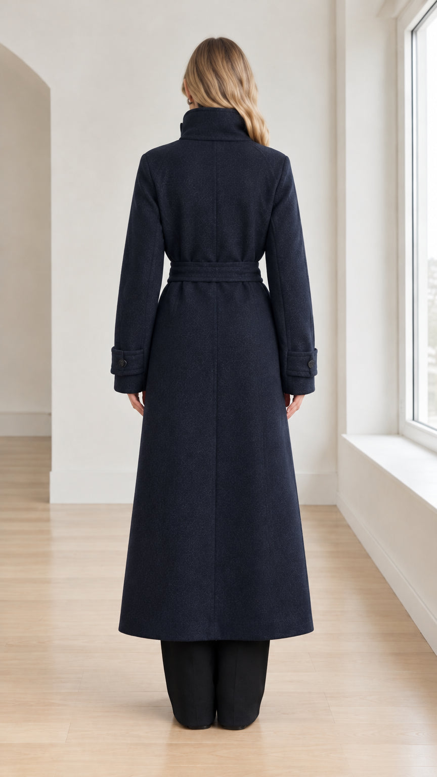 Back view of model wearing Navy Blue belted maxi coat