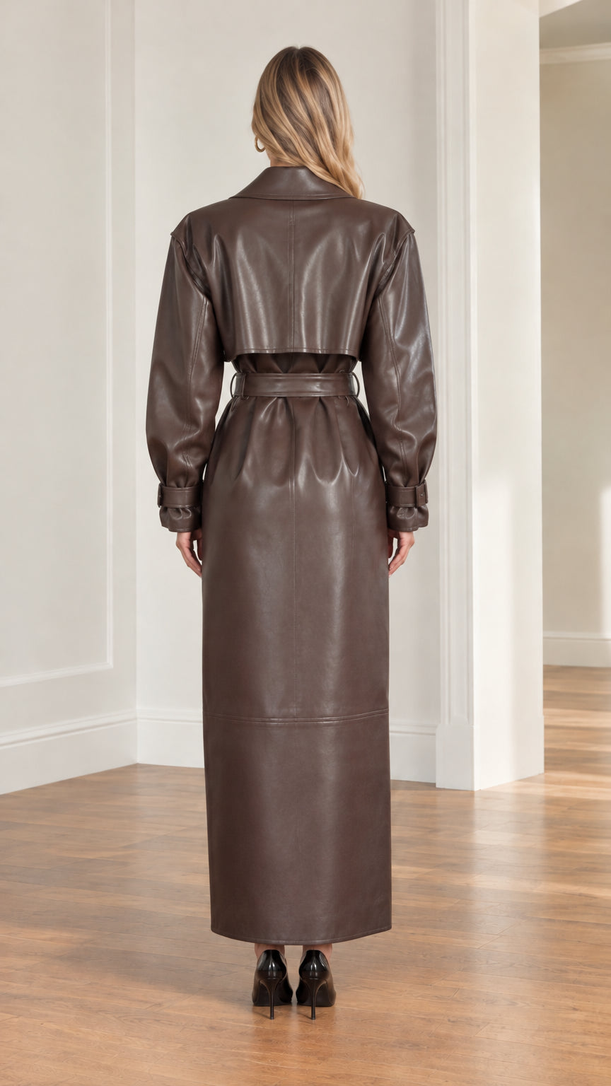 Back view of brown faux leather maxi trench coat showing back storm flap and belt
