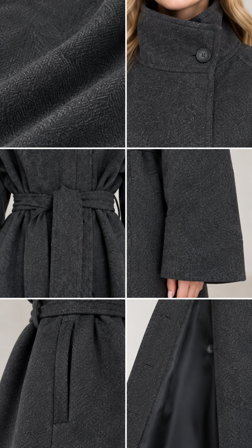 Close-up details of charcoal coat showing fabric texture, high button collar, tie belt, sleeve cuff, pocket, and lining