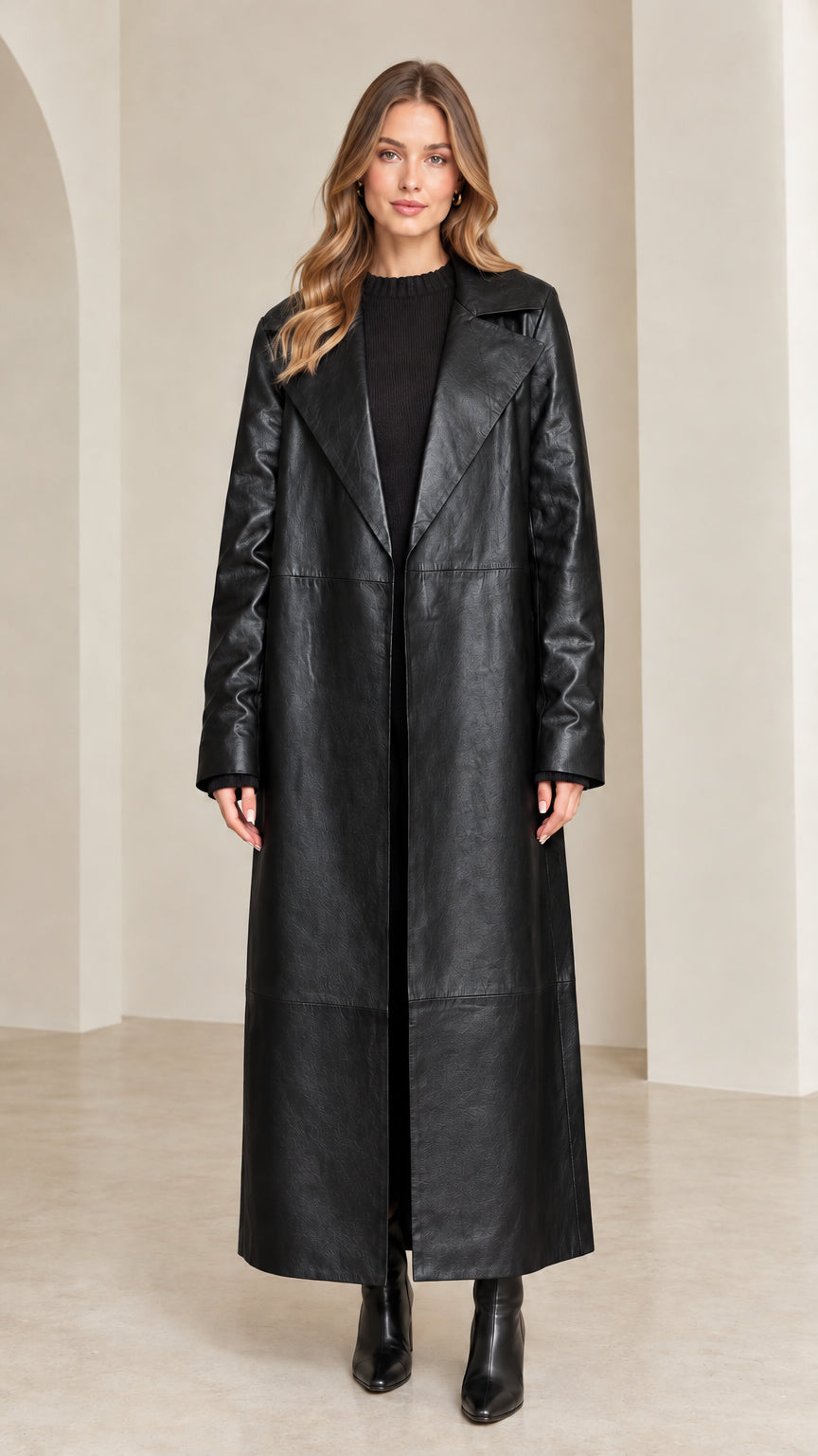 Full front view of black maxi faux leather trench coat on model