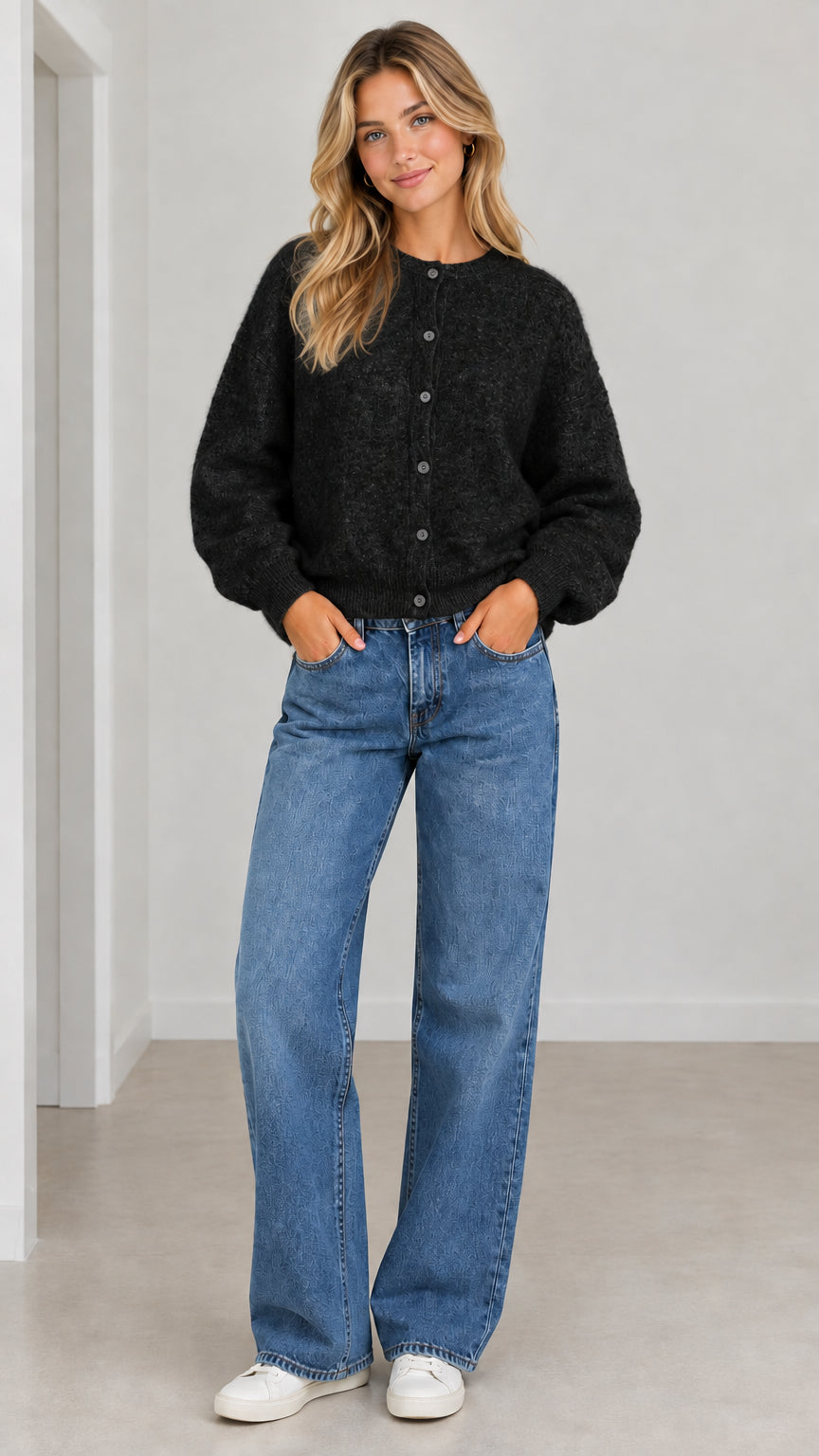 Woman wearing Black fuzzy knit button-front cardigan sweater