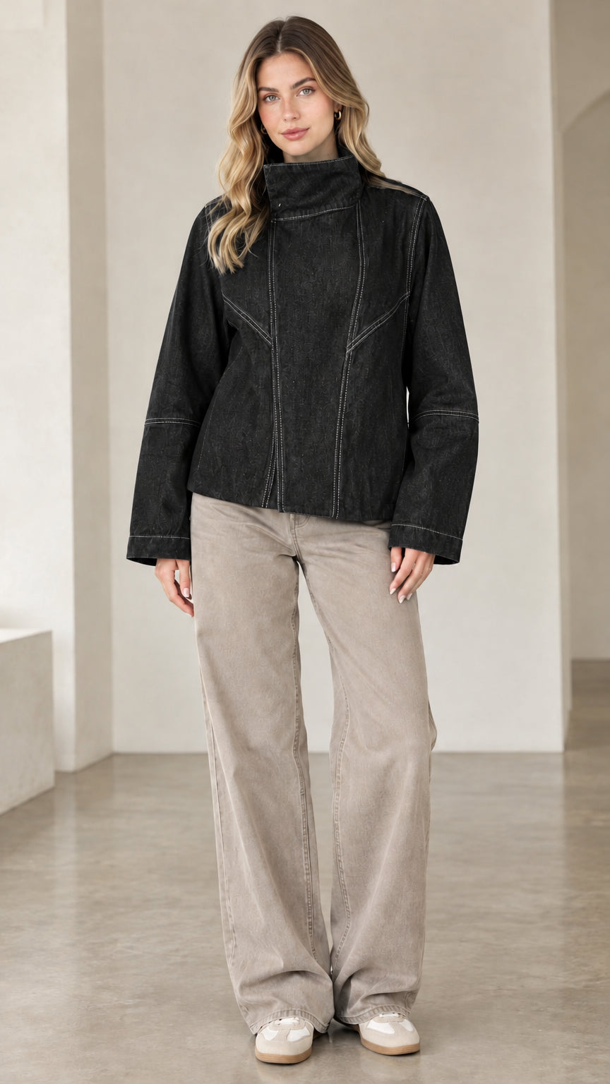 Model wearing black high neck contrast seam denim jacket