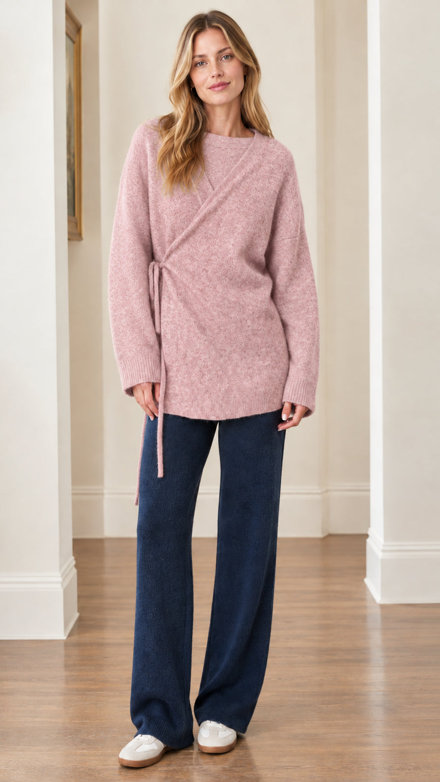 Woman wearing Dusty Pink wrap-style side-tie knit tunic sweater