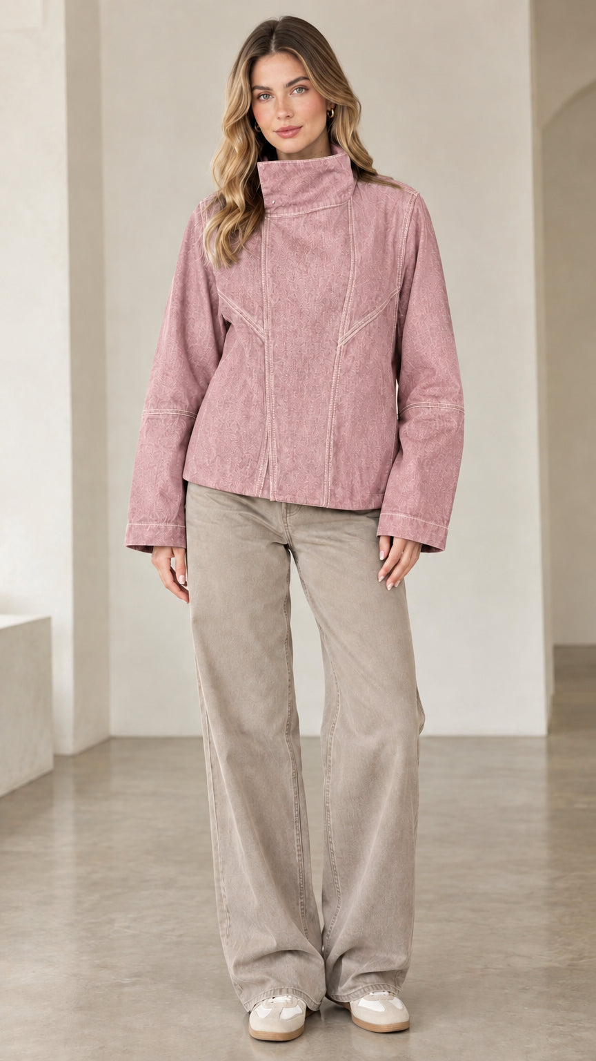 Model wearing dusty pink high neck contrast seam denim jacket