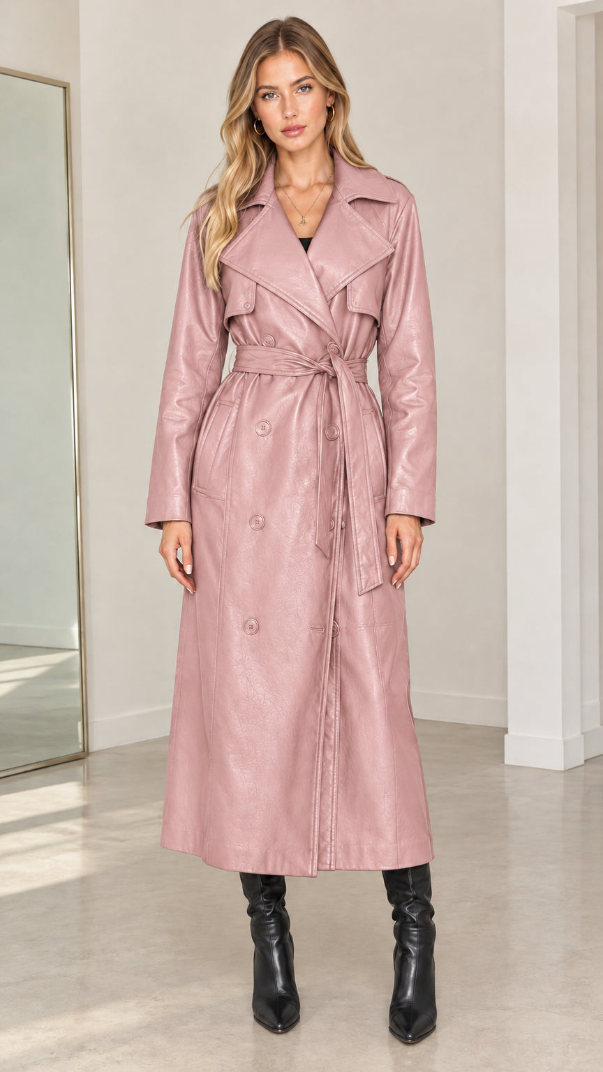 Front view of model wearing dusty pink faux leather double-breasted maxi trench coat