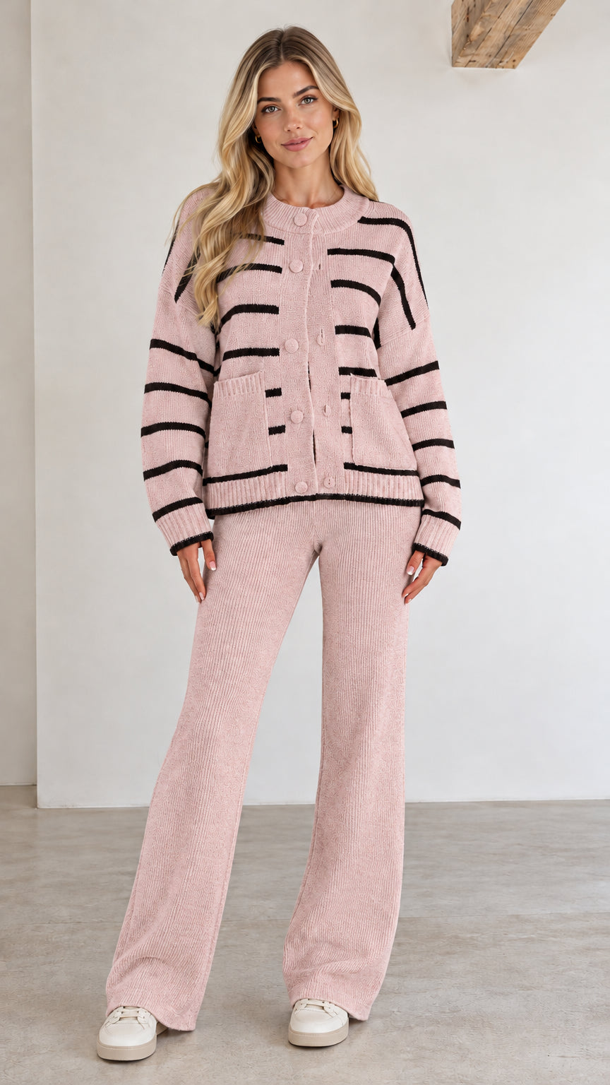 Front view of pink striped knit cardigan and wide-leg lounge pants set