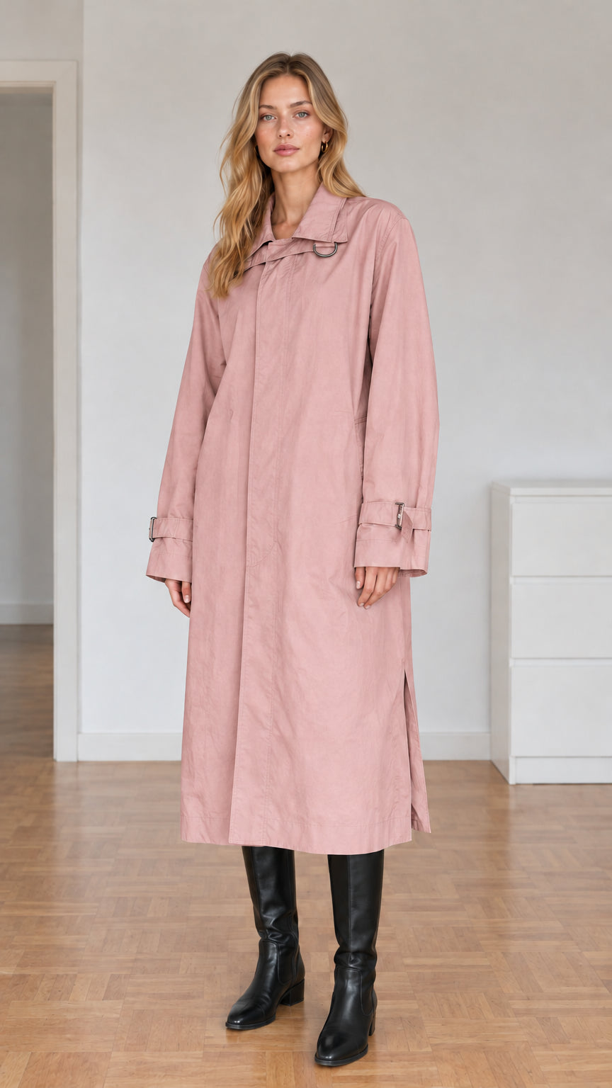Front view of model wearing dusty pink longline trench coat