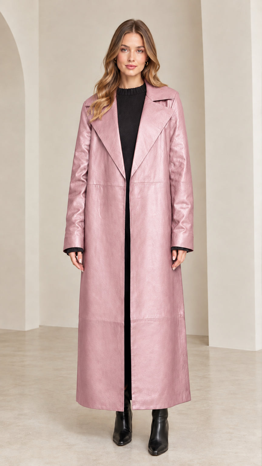 Full front view of dusty pink maxi faux leather trench coat on model