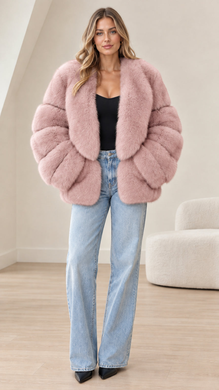 Front view of model wearing dusty pink faux fur paneled jacket with wide-leg jeans