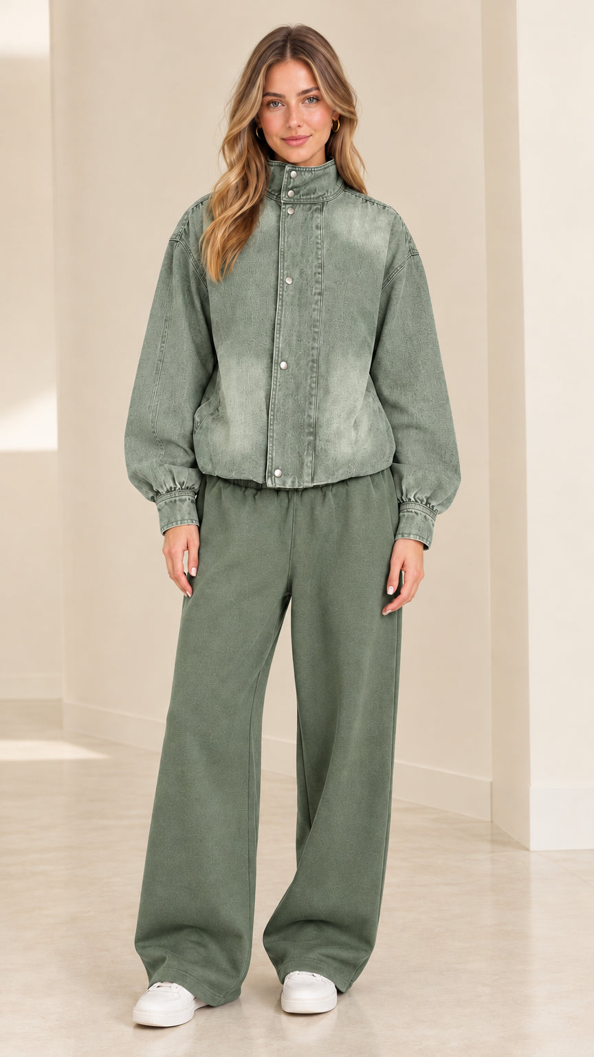 Model wearing washed sage green jacket and matching sage green wide-leg pants