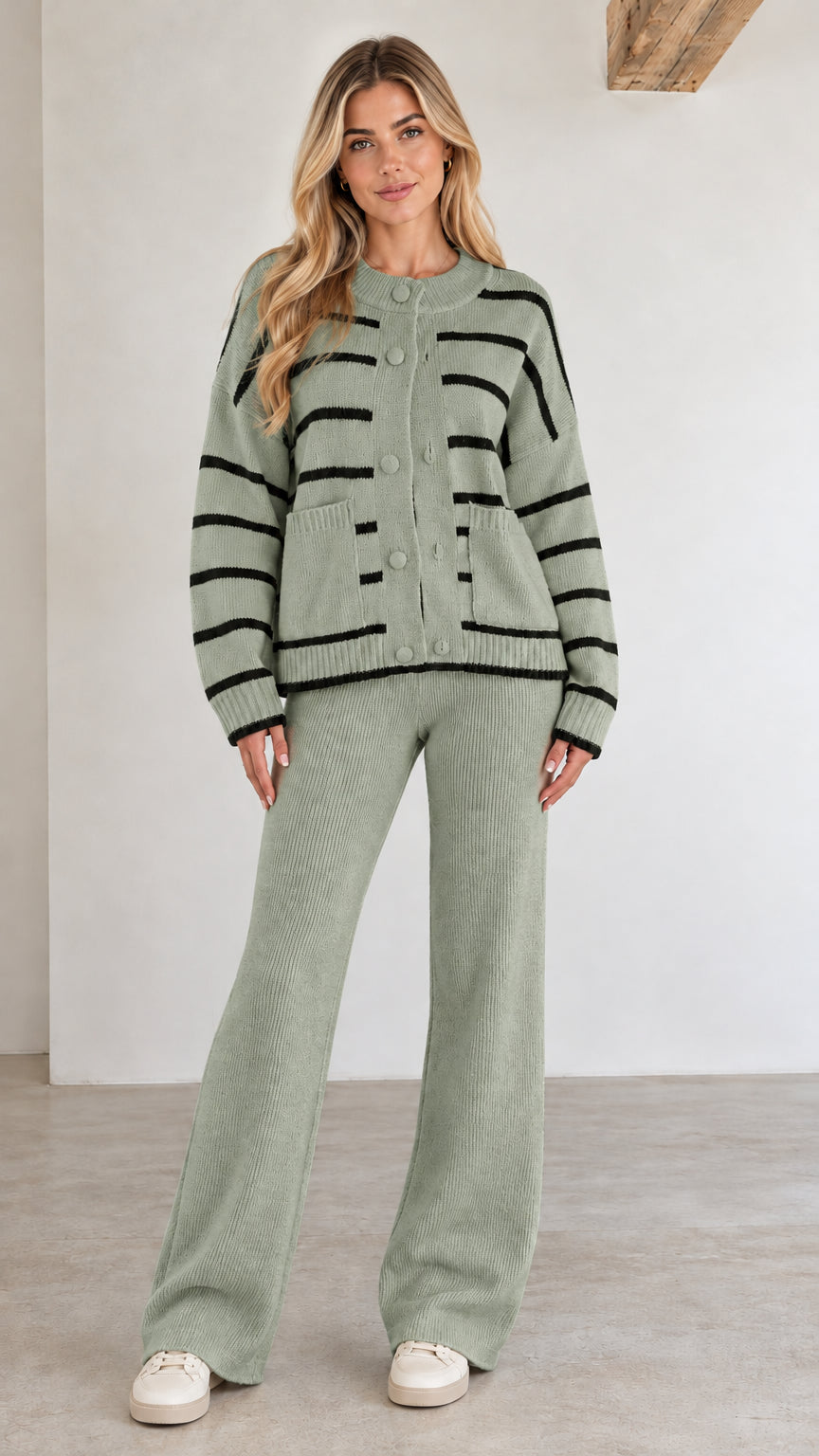 Front view of sage green striped knit cardigan and wide-leg pants set