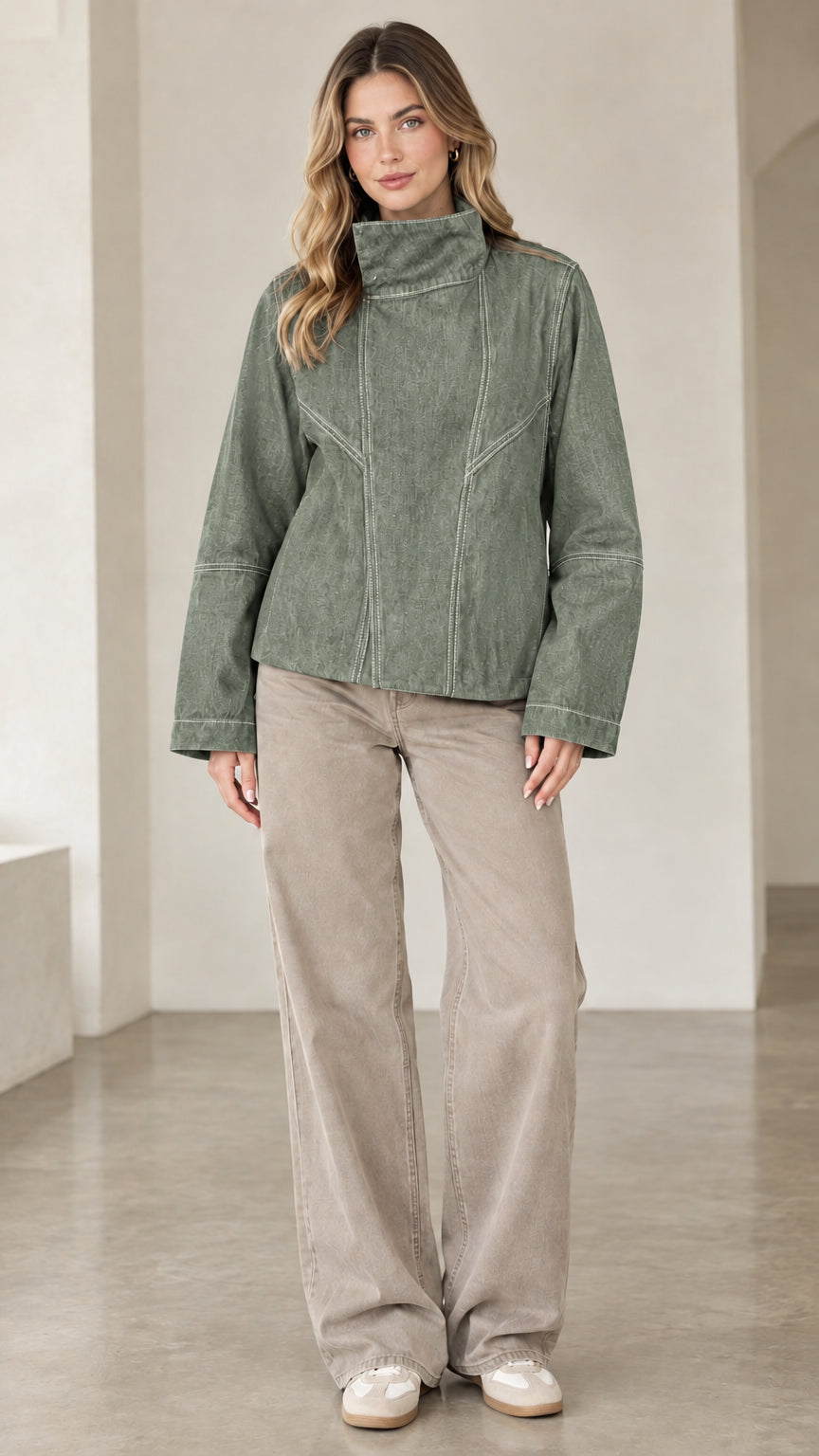 Model wearing sage green high neck contrast seam denim jacket