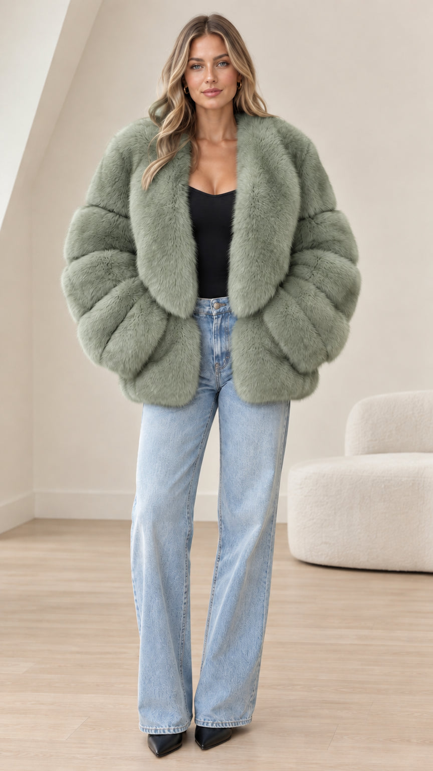 Front view of model wearing sage green faux fur paneled jacket with shawl lapel