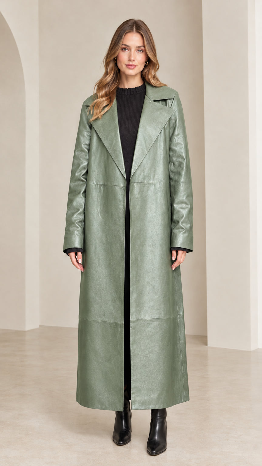 Full front view of sage green maxi faux leather trench coat on model