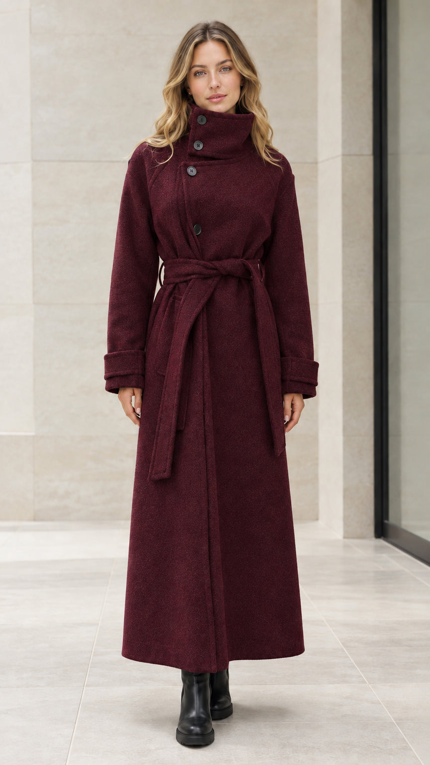 Front view of woman wearing burgundy wine red high neck belted maxi overcoat
