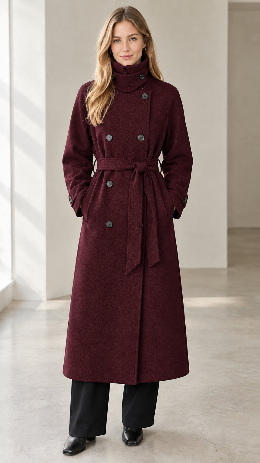 Front view of model wearing burgundy wine red longline belted winter overcoat