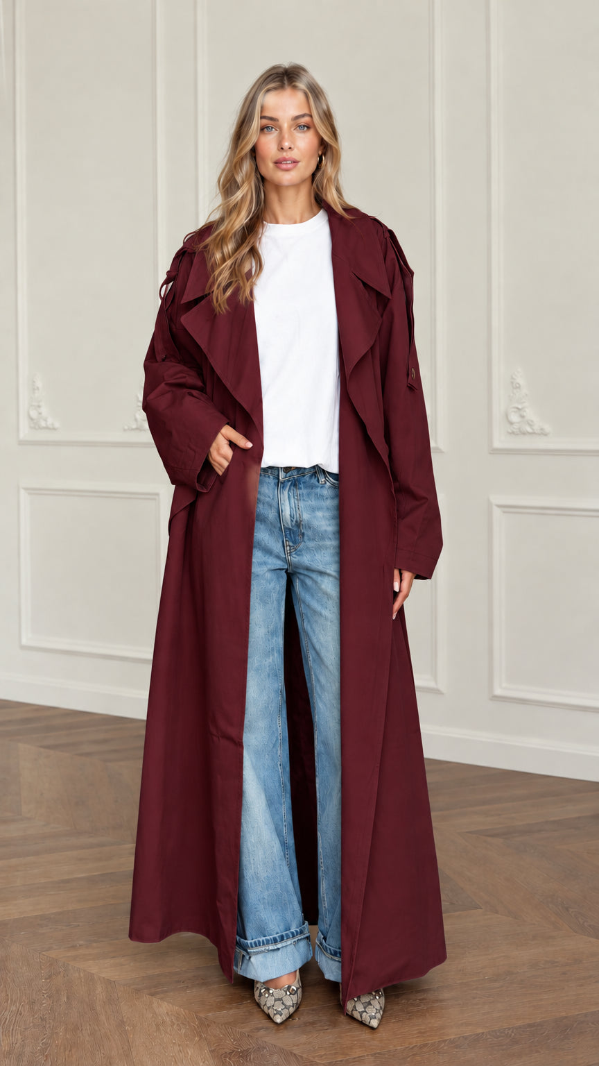 Front view of woman wearing burgundy wine red oversized maxi trench coat