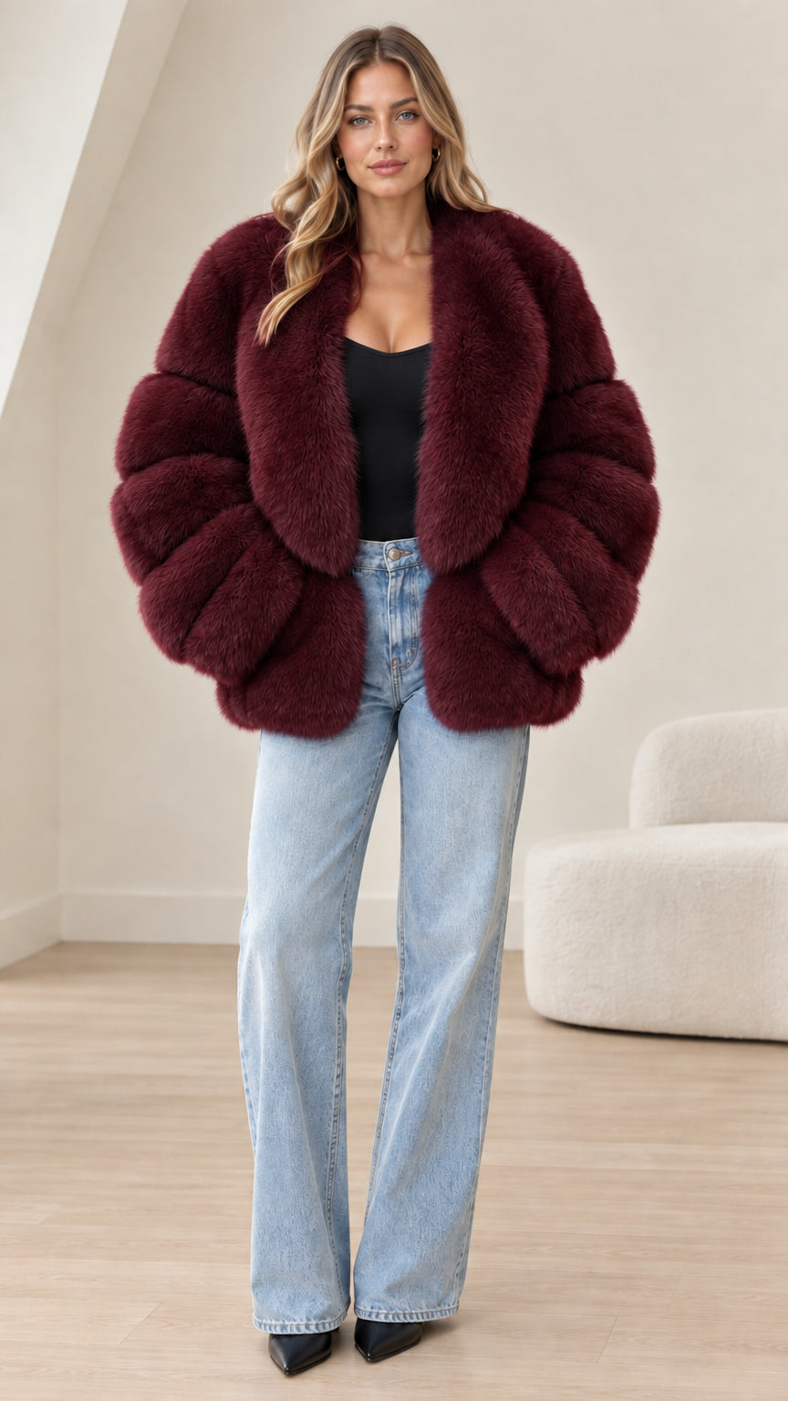Front view of model wearing deep burgundy wine faux fur paneled jacket