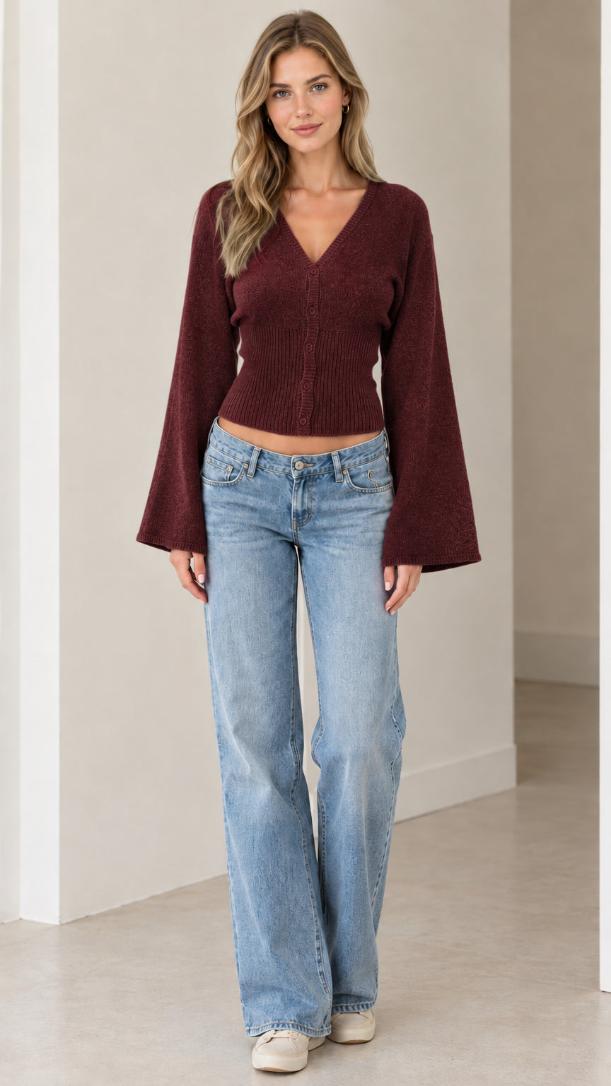 Full front view of model wearing burgundy V-neck bell sleeve knit cardigan
