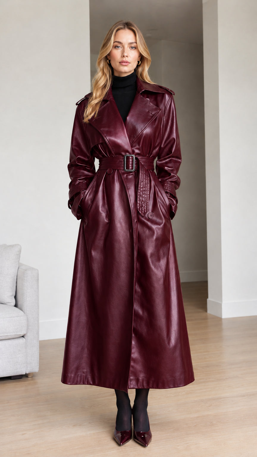 Front view of model wearing burgundy wine red faux leather maxi trench coat