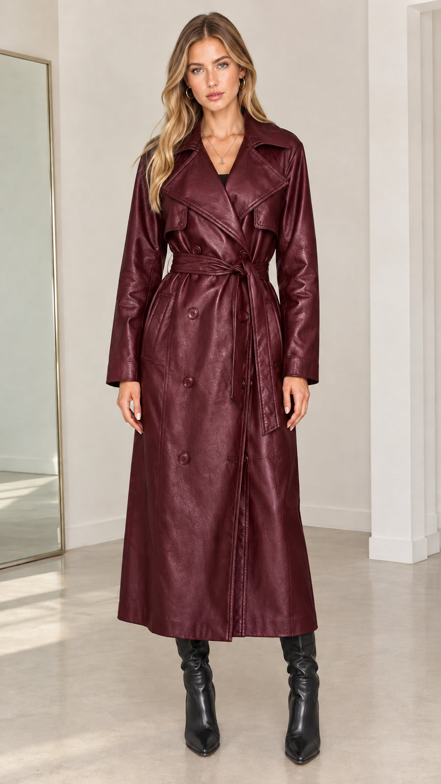 Front view of model wearing burgundy wine red faux leather maxi trench coat