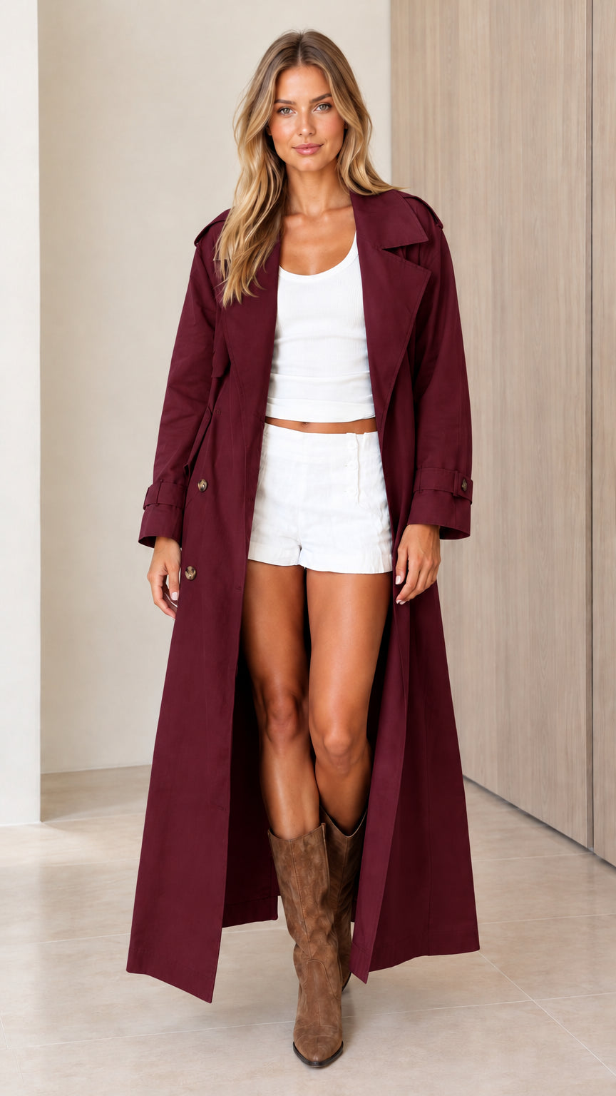 Front view of a model wearing the burgundy wine red longline maxi trench coat
