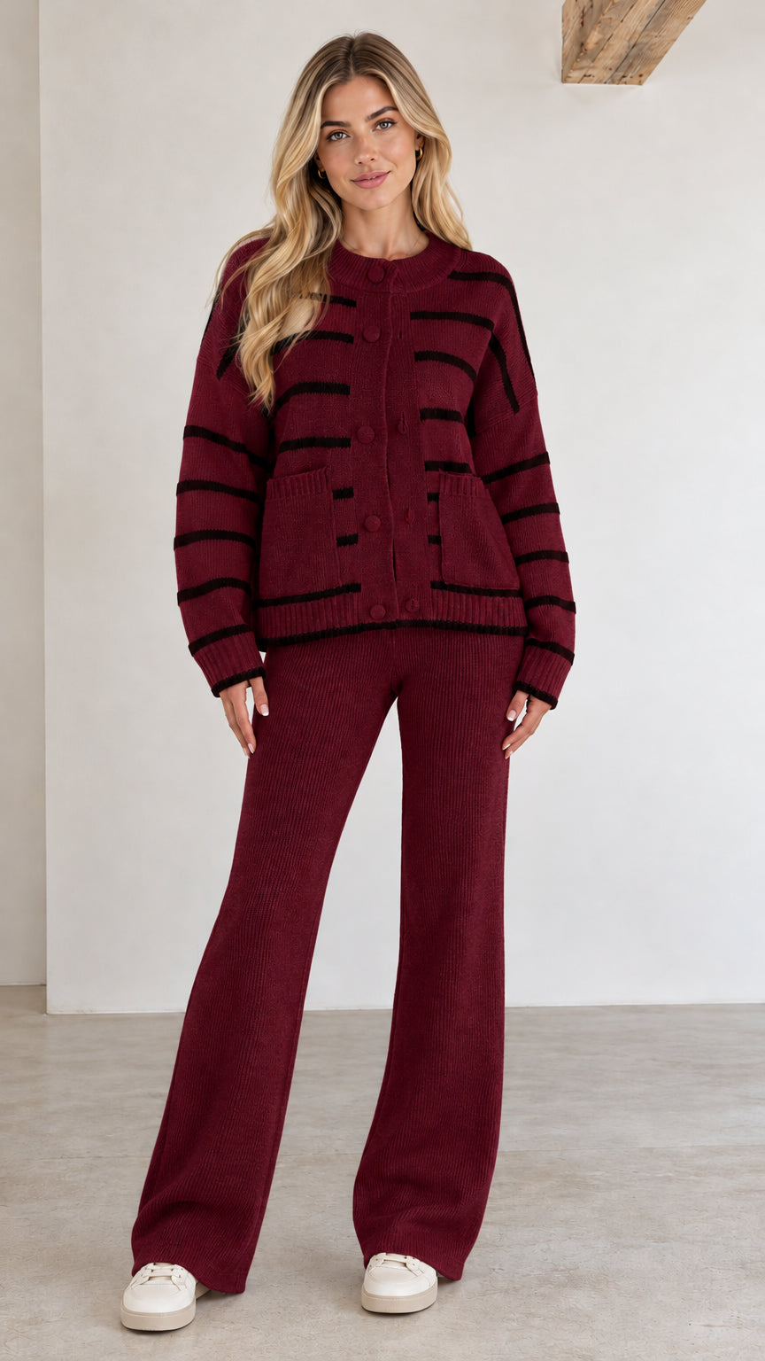 Front view of burgundy striped knit cardigan and wide-leg lounge pants set