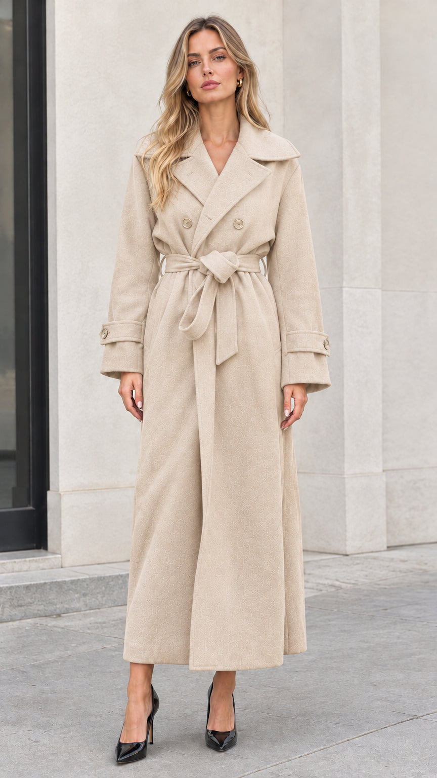 Front full-length view of woman wearing beige oatmeal double-breasted maxi overcoat