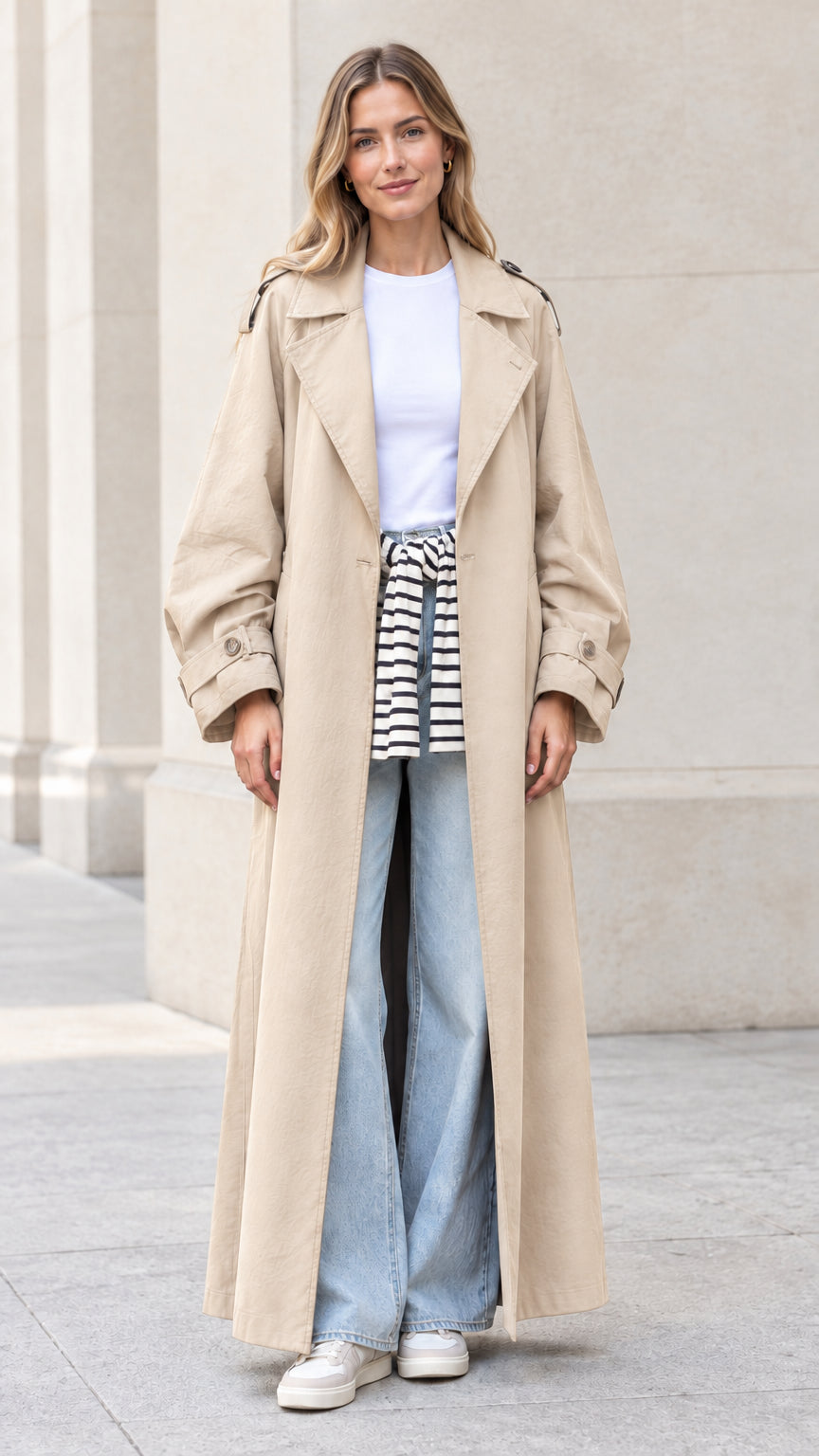 Front full view of woman wearing beige khaki maxi trench coat