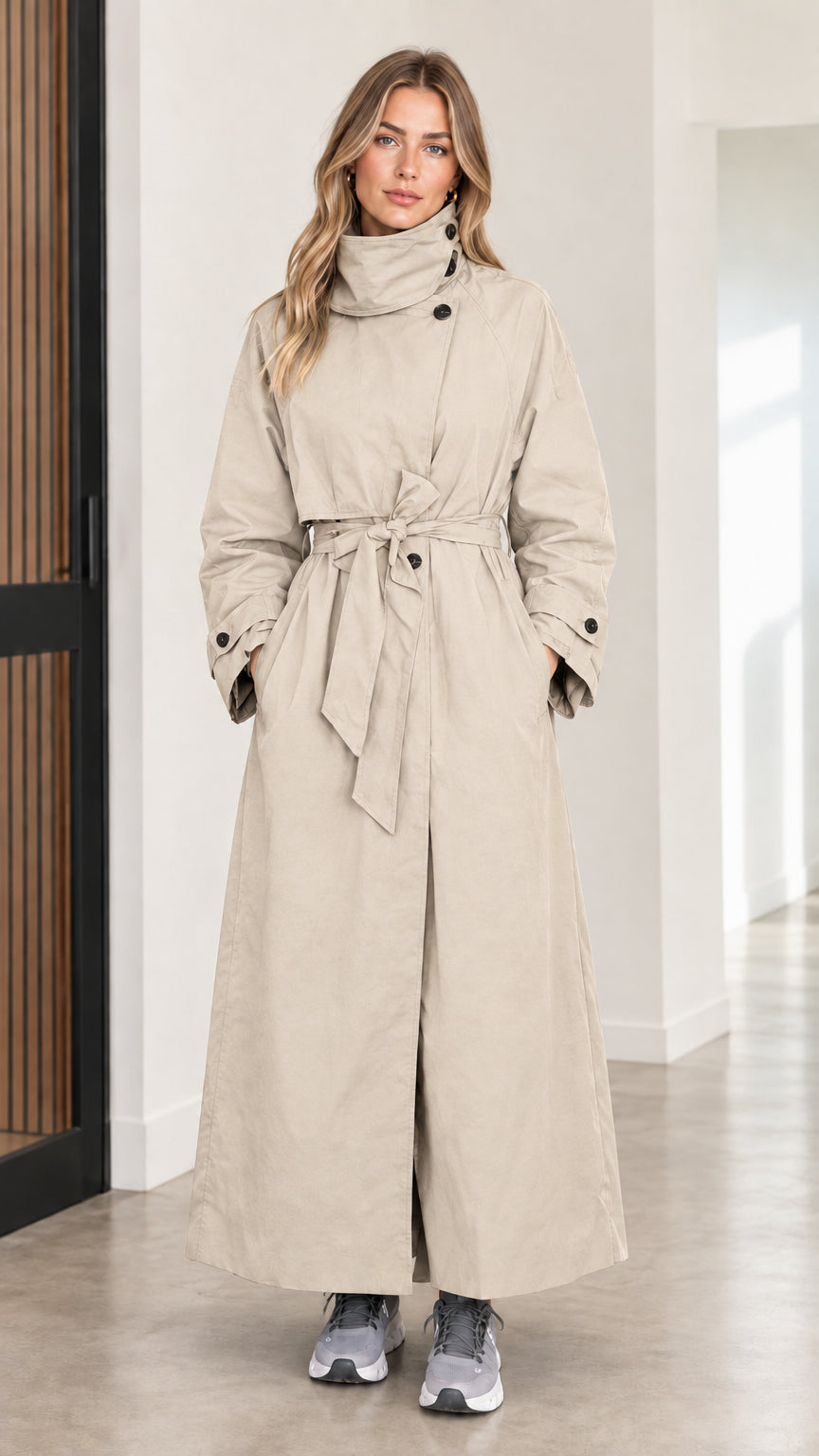 Full front view of women's beige light khaki high neck maxi belted trench coat