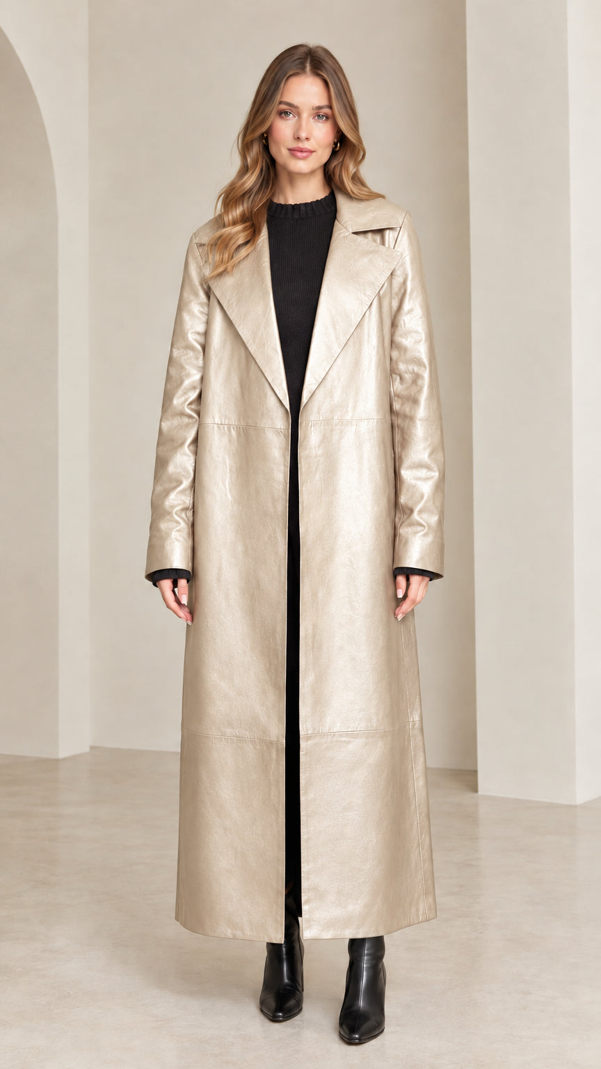 Full front view of metallic champagne beige maxi faux leather trench coat on model