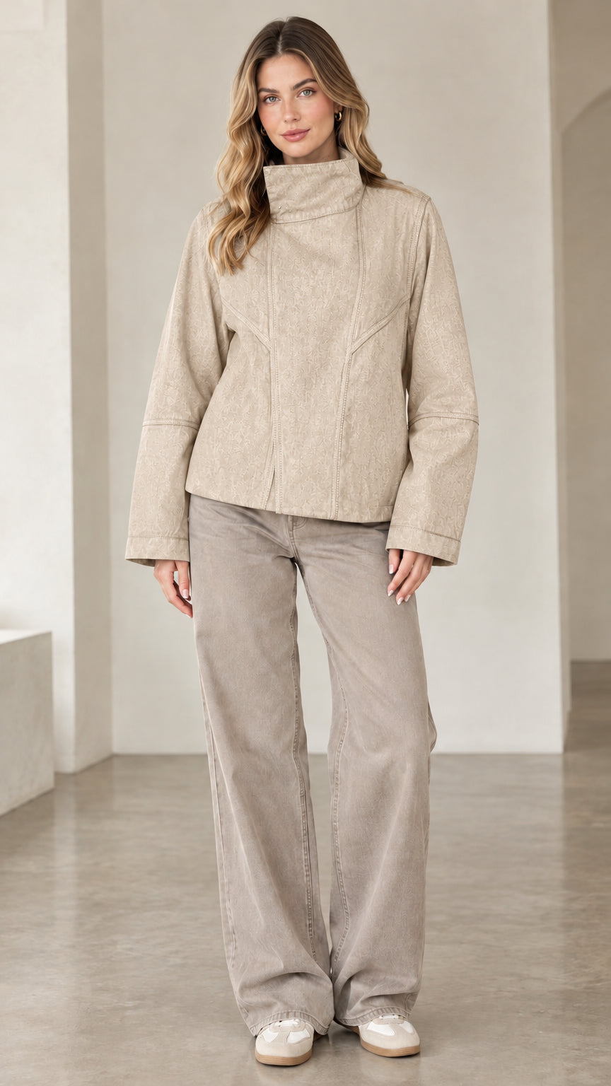 Model wearing beige high neck contrast seam denim jacket
