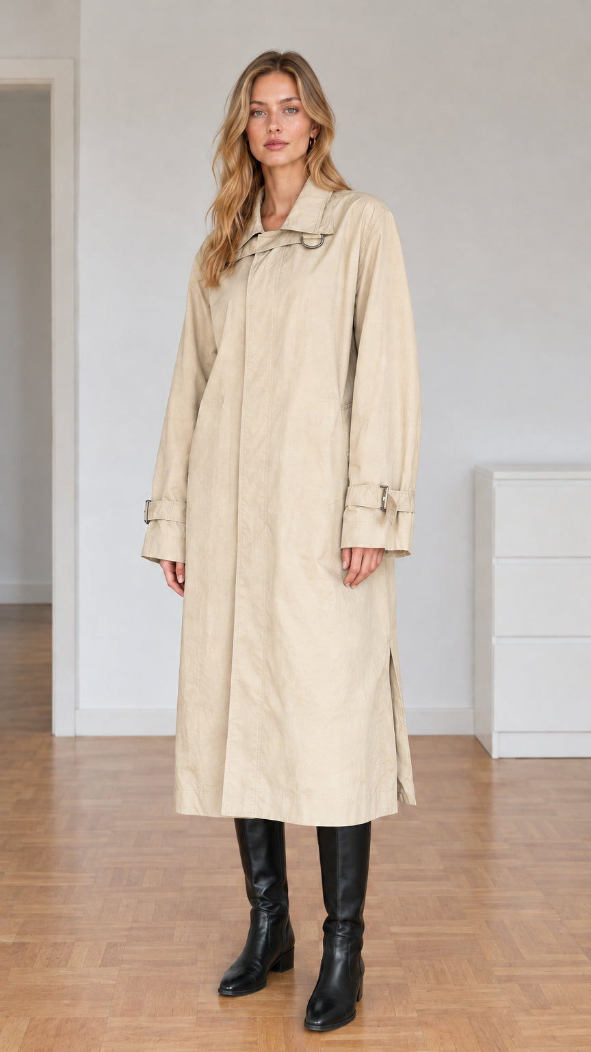Front view of model wearing beige light khaki longline trench coat