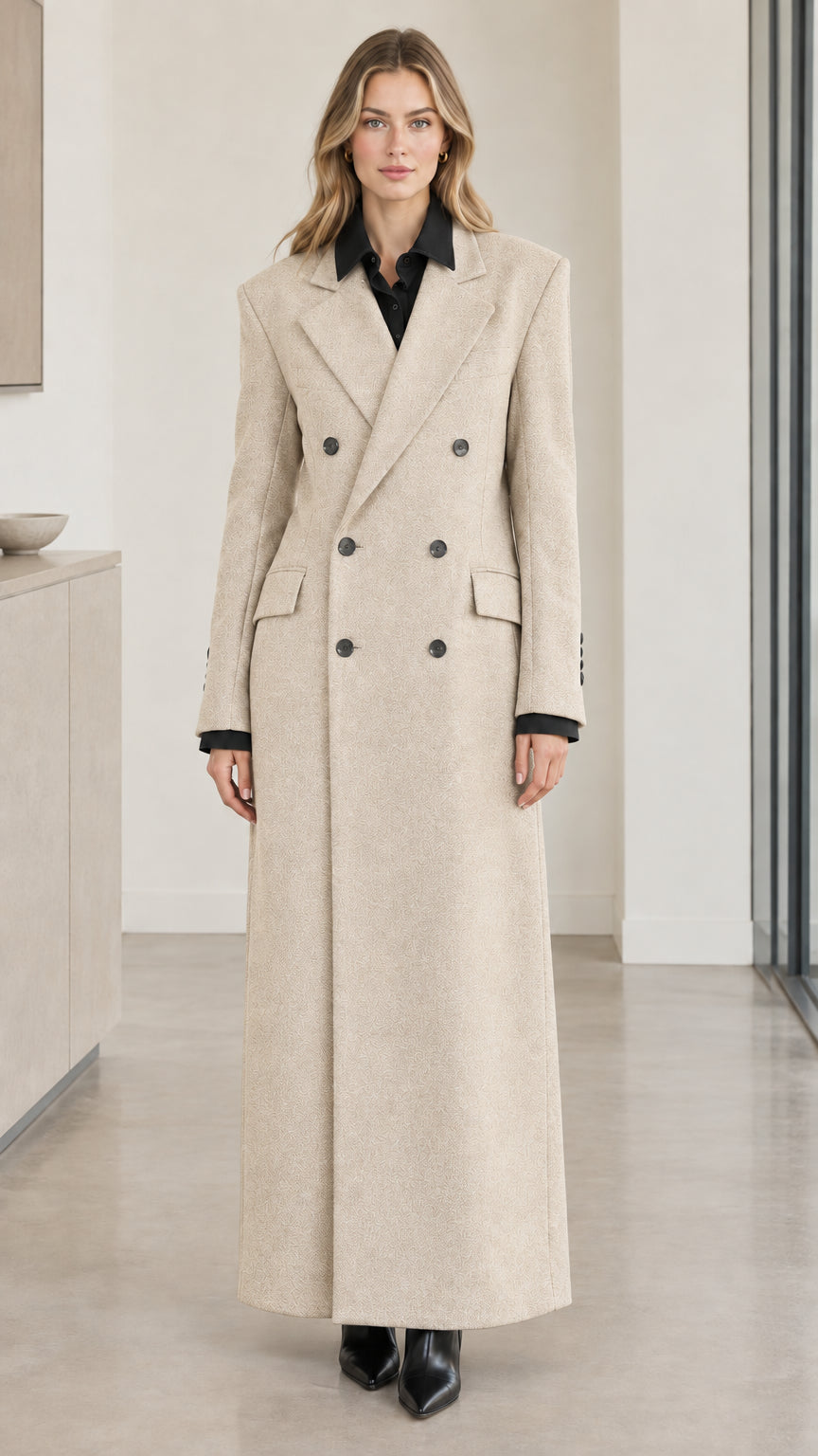 Front full-length view of woman wearing beige oatmeal double-breasted maxi overcoat